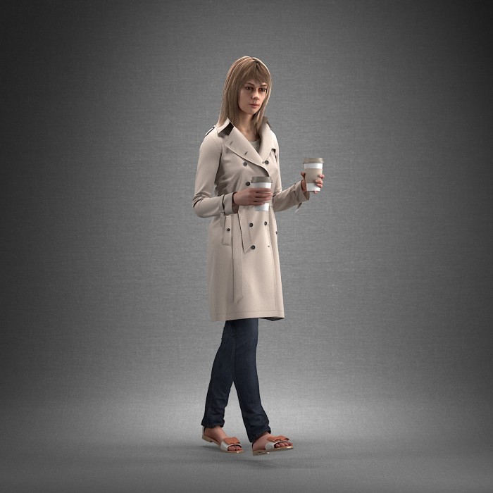 Steph looking to the right, holding coffee Smart Casual